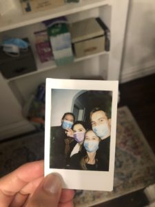 Four people wearing masks